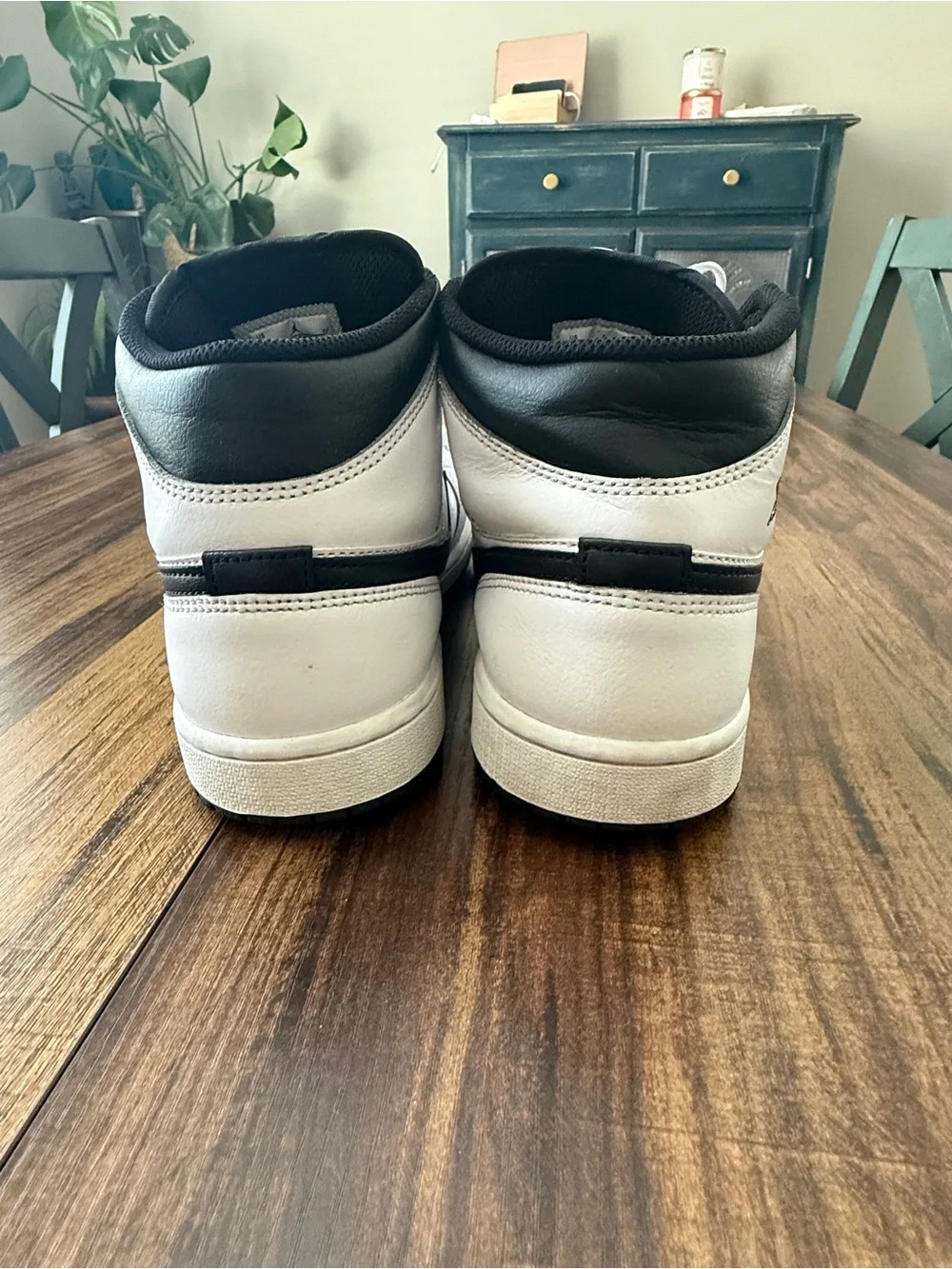 Nike Air Jordan 1 White and Black Mid-Top Sneakers